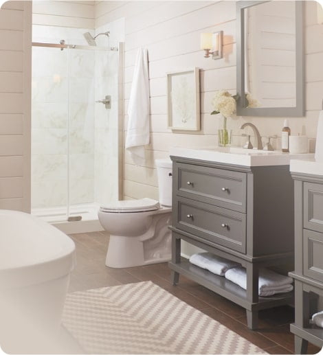 bathroom photo showing sink, toilet and shower